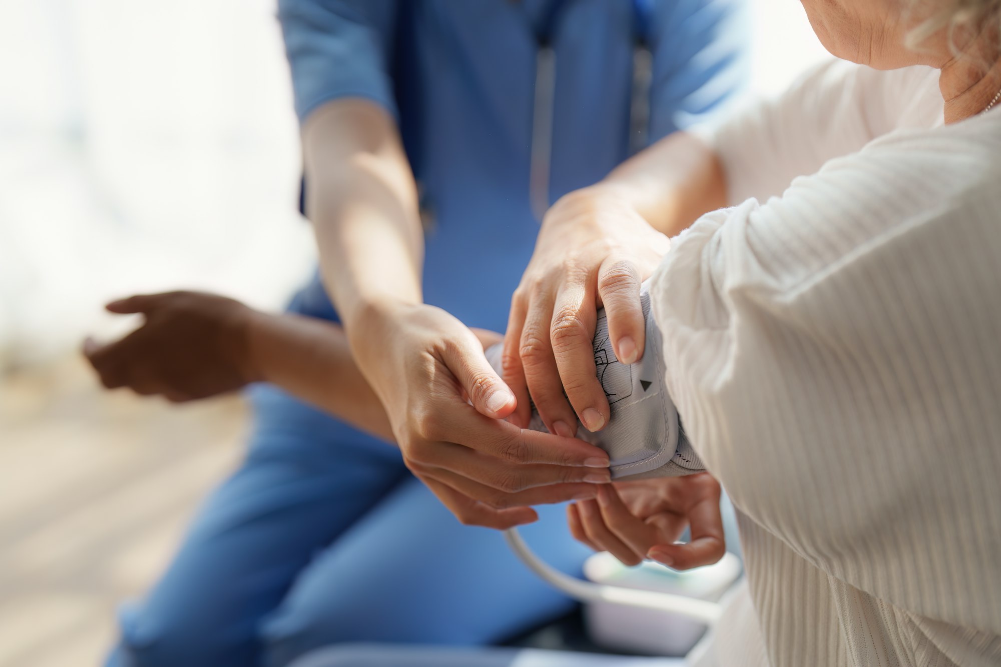 Home healthcare nurse, physical therapy with senior adult woman at home